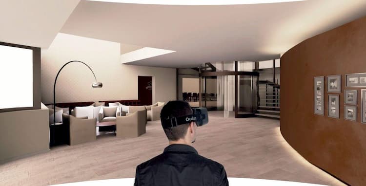 1 người đàn ông dùng VR để quan sát ngôi nhà